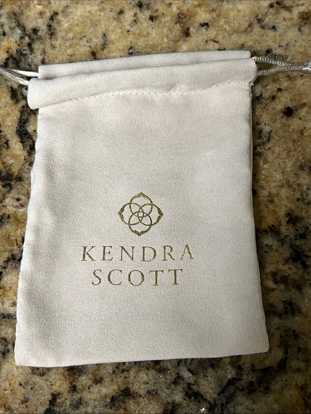 Kendra Scott Cream Drawstring Pouch with Gold Logo